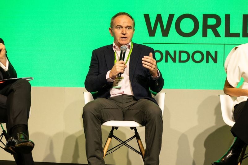 George Eustice on stage at World Agri-Tech London. He believes farmers will require stronger returns if they are to invest in the technologies and infrastructure needed to remain productive in a more volatile climate.