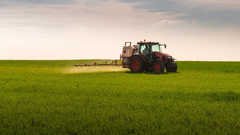 A tractor spraying