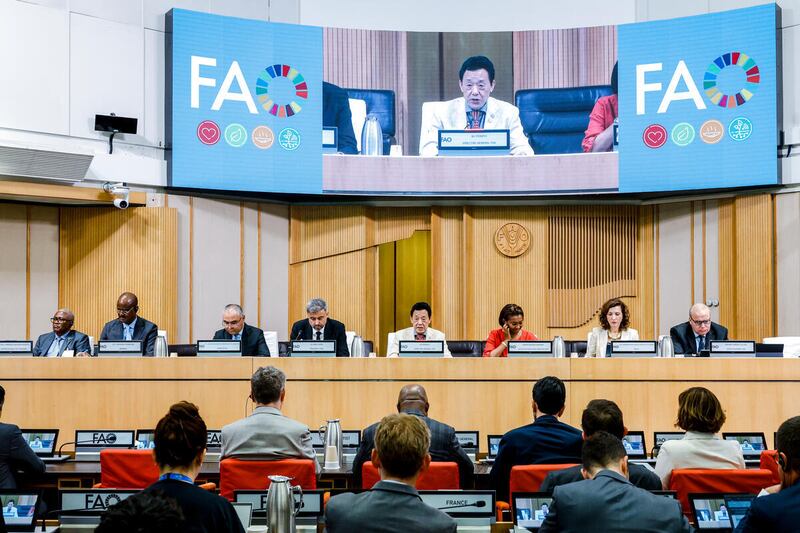 21 July 2026. Rome, Italy. Food and Agriculture Organization of the United Nations (FAO) Director-General QU Dongyu (on screen) delivers his opening remarks at the launch of the 2026 State of Food Security and Nutrition in the World (SOFI) report. FAO headquarters (Red Room).
