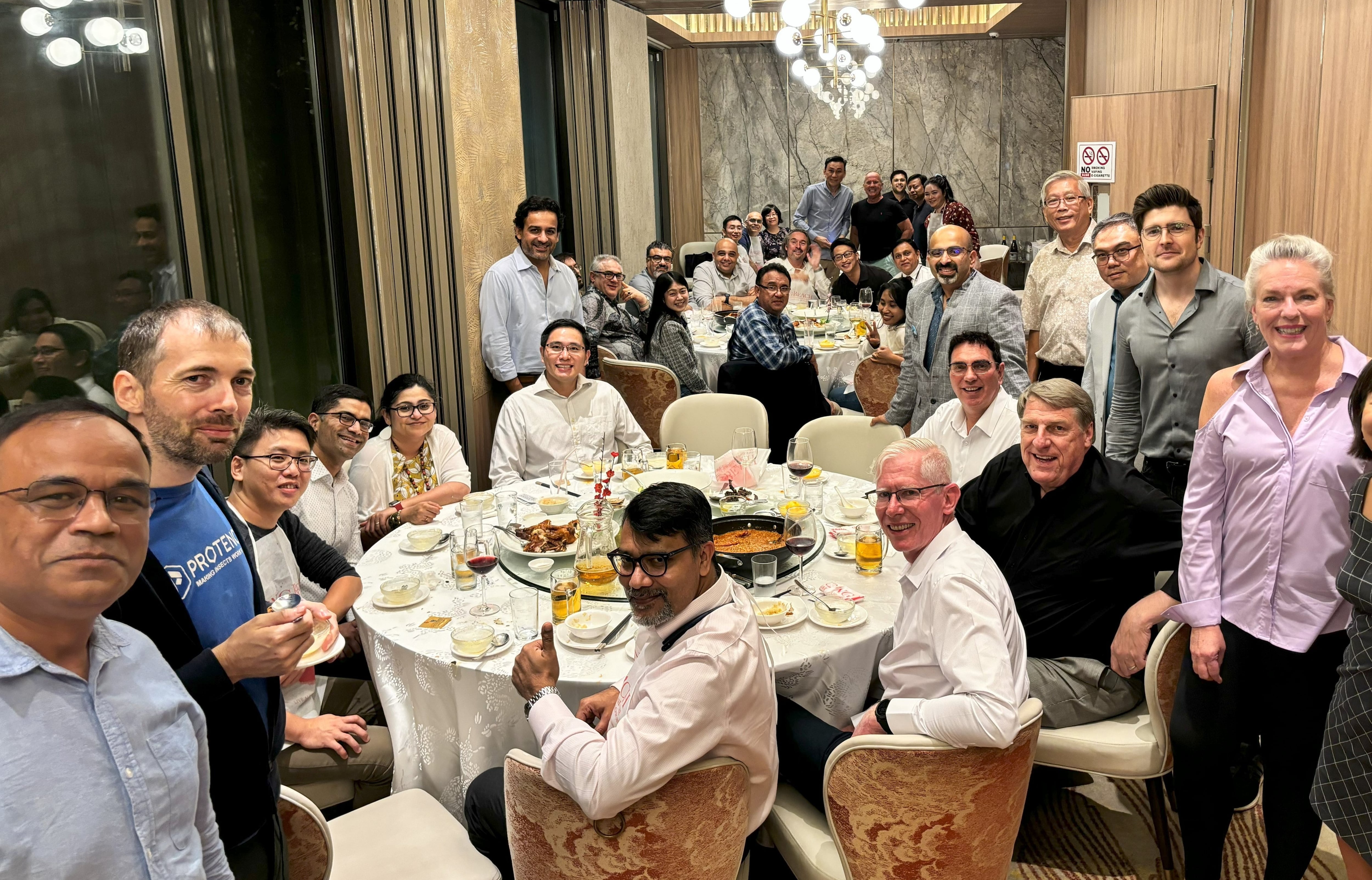 The Yield Lab Asia Pacific portfolio companies and investors annual Chili Crab dinner in Singapore. Michelle Chee taking picture.